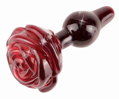 Buttplug van rood glas met rozen stopper